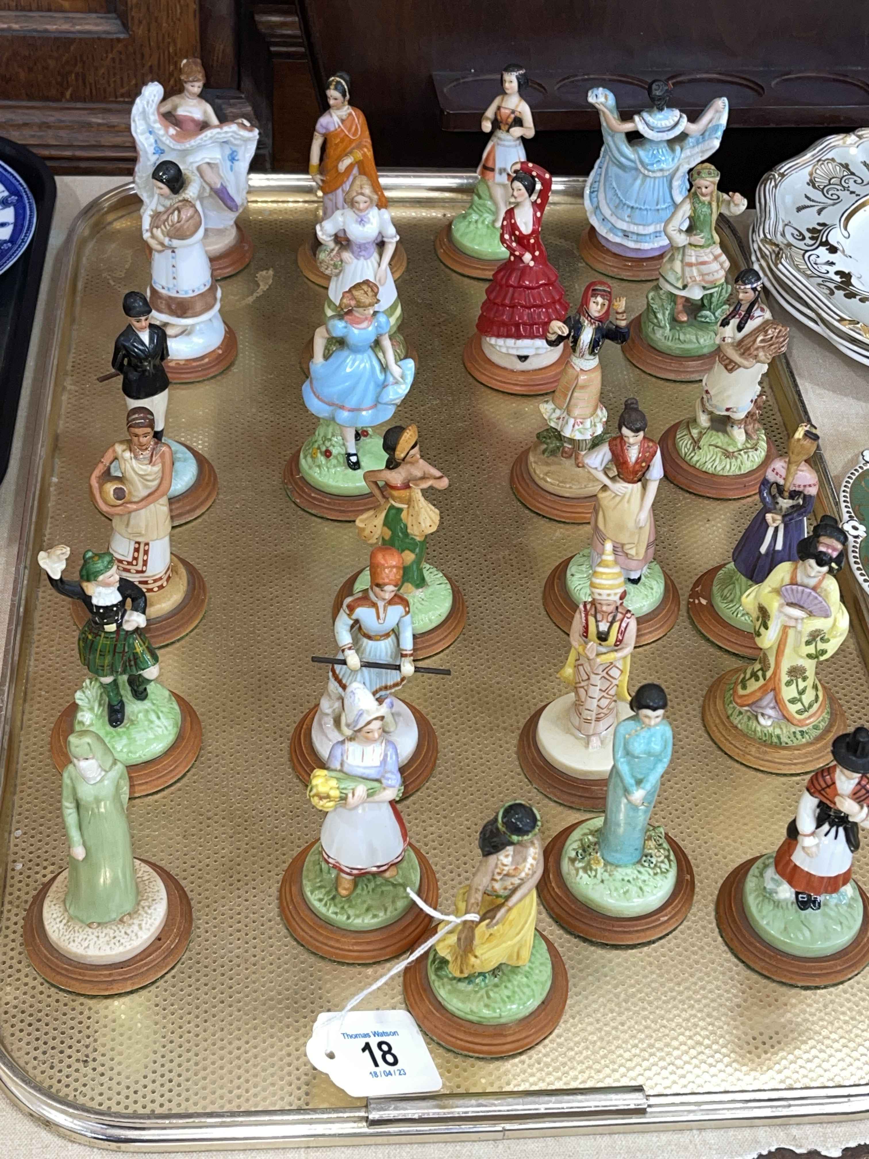 Twenty five Danbury Mint 'Lovely Ladies of Many Lands' with display stand.