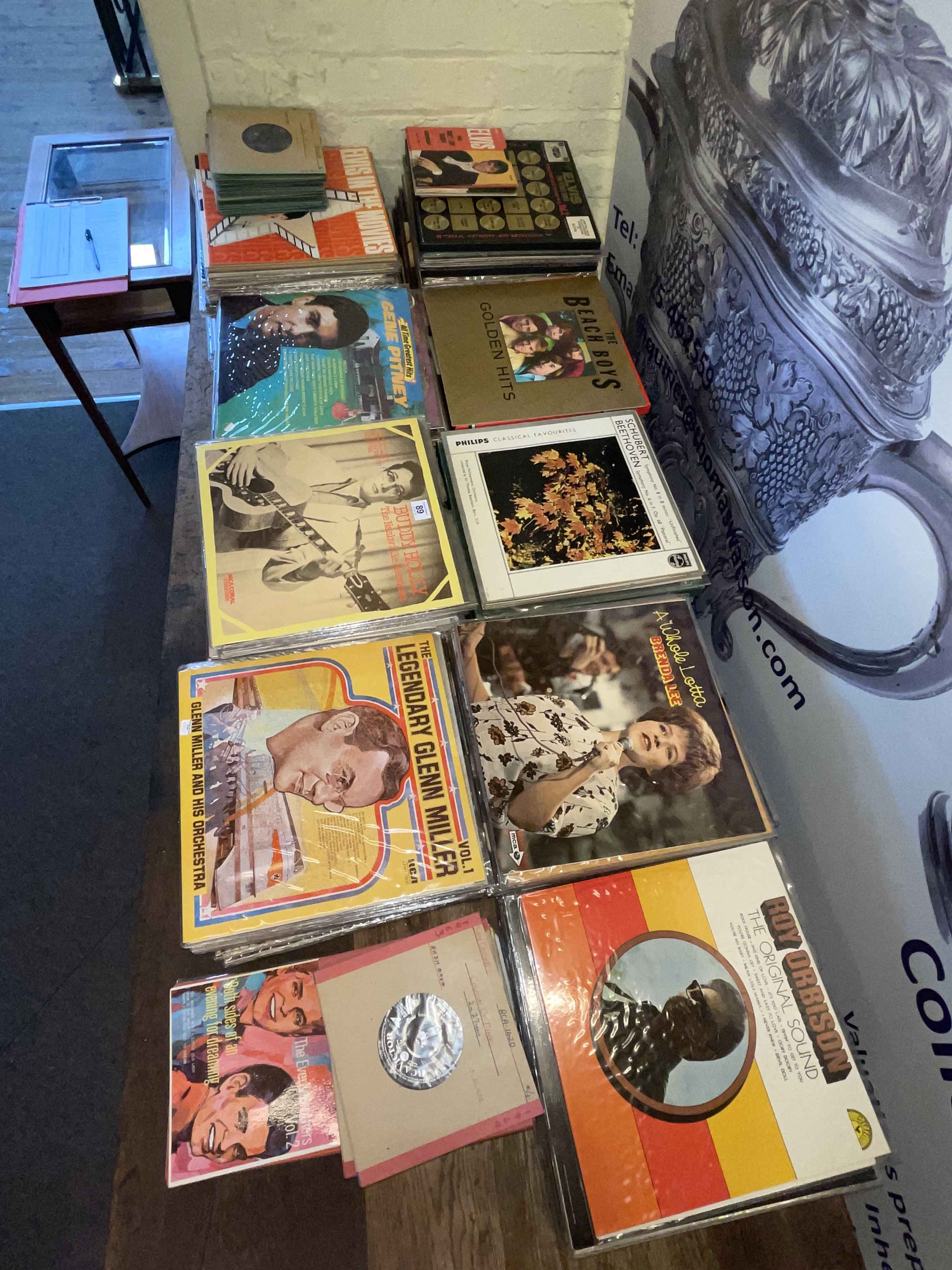 Collection of LP records and singles including Elvis, etc.