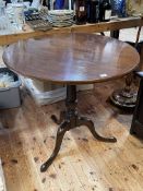 19th Century circular mahogany tripod table, 76cm by 80cm diameter.