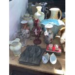 Collection of vases including Mary Gregory ruby glass, Oriental etc, and three lead fire plaques.