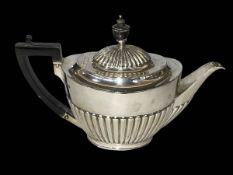 Silver part fluted teapot, London 1906.