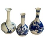 Three Chinese blue and white bottle neck vases.
