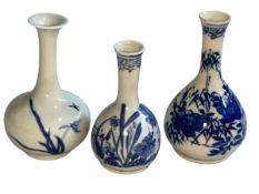 Three Chinese blue and white bottle neck vases.