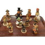 Collection of eleven Hummel figures.