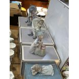 Four Lladro figurines with boxes including F81CD, 501SH, 76CT4 and 041F5.