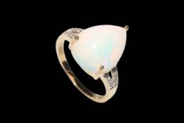 Opal drop shape 9k gold ring, size Q.