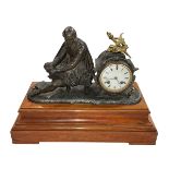 Ornate spelter Shakespeare figure clock on wood base, 32cm.