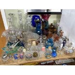 Collection of glass including perfume bottles, paperweights, decanters, coloured glass, etc.