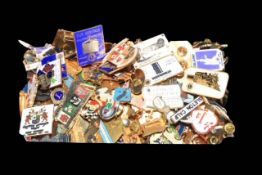 Box of Lions Club International badges.