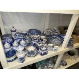 Collection of blue and white pottery including Ringtons, Old Willow, etc,