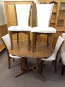 Little used Ercol extending dining table and four chairs.