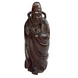 Hardwood carving of a Chinese Elder.