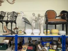 Collection of garden statues and pots including semi-nude ladies, heron, crocodile head, etc.