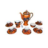Maling lustre thirteen piece coffee set decorated with birds and butterflies.
