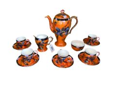 Maling lustre thirteen piece coffee set decorated with birds and butterflies.