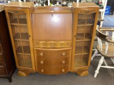 Oak bureau centre cabinet.