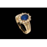 Sapphire and diamond 18 carat gold cluster ring, having approximately 1.