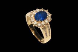 Sapphire and diamond 18 carat gold cluster ring, having approximately 1.