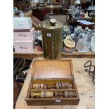 Vintage skittles in box and brass pressure pump.