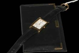 Raymond Weil tank style 18 carat gold plated wristwatch, with papers.