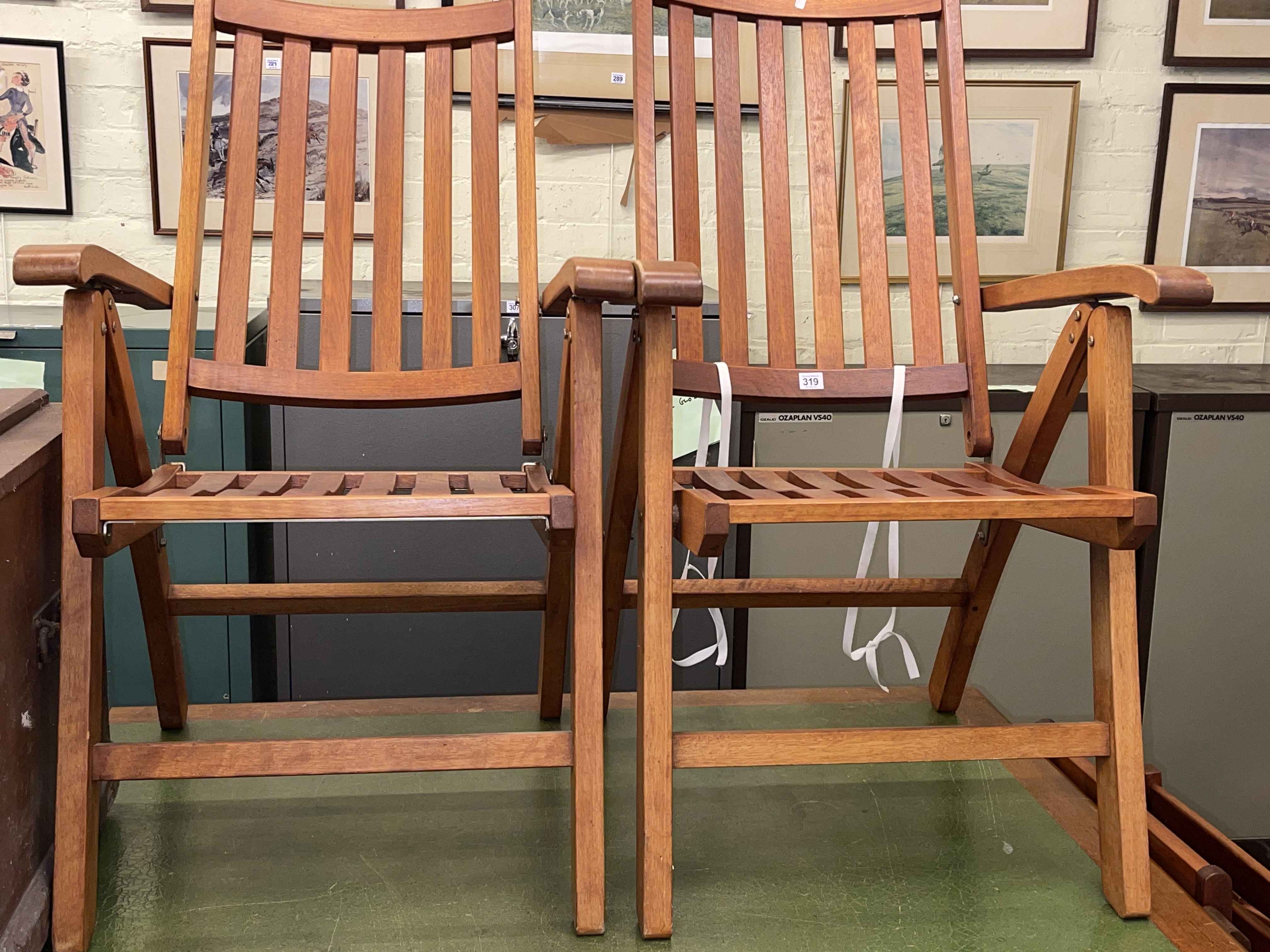 Four adjustable teak folding garden chairs (3x1).