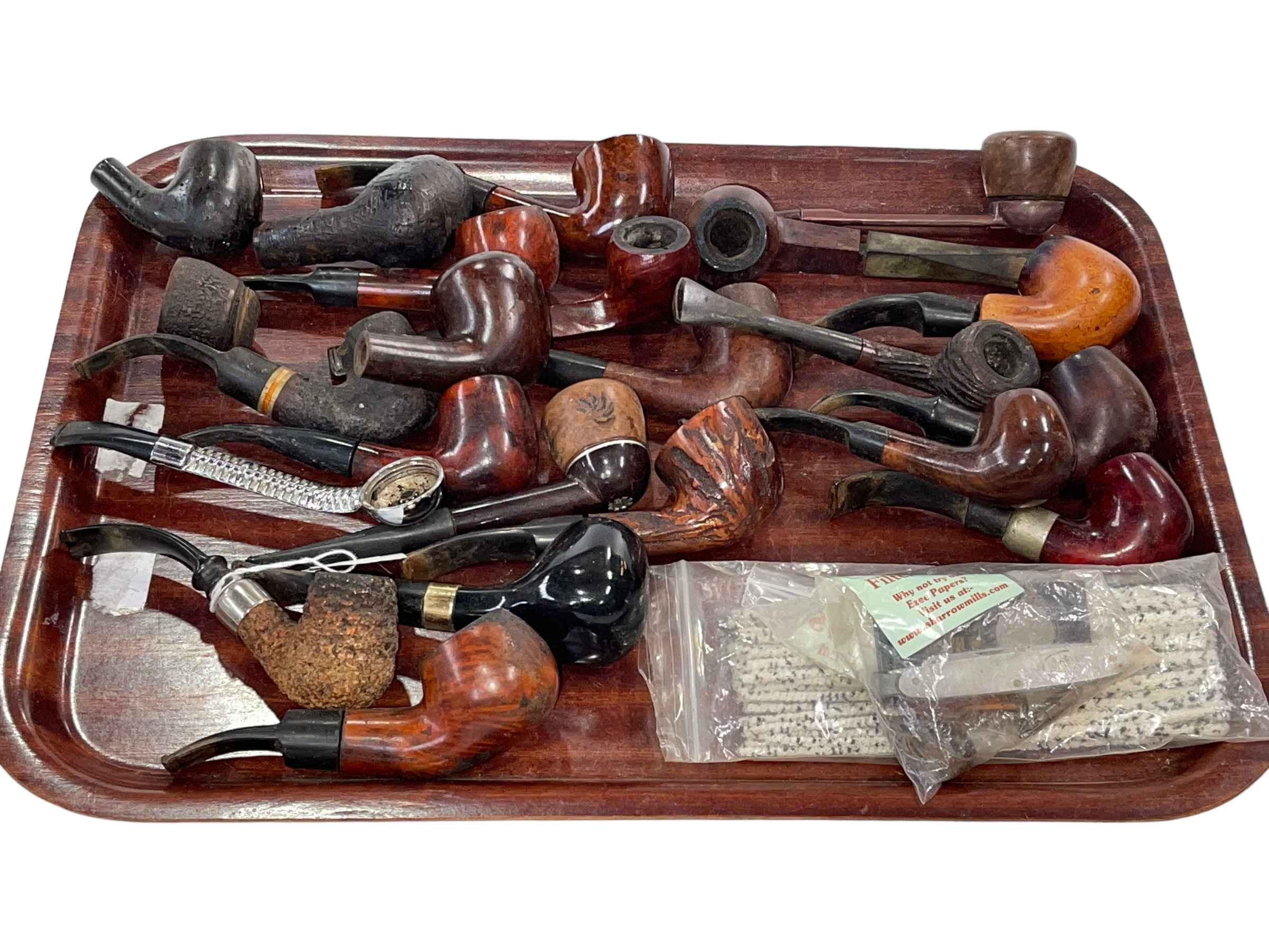 Collection of over twenty pipes.