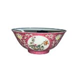 Chinese porcelain bowl with Famille Rose and floral outer pattern and blue and white interior