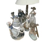 Six Nao figure and groups including table lamp.