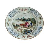 Chinese polychrome plate decorated with figure in landscape, 22.5cm diameter.