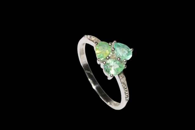 Paraiba Tourmaline and diamond limited edition 9 carat gold ring, size N/O, with certificate.