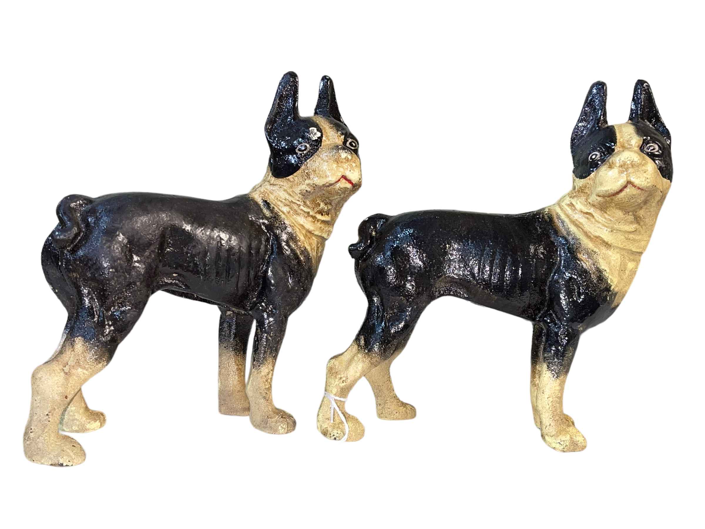 Pair of cast iron Boston Terrier dogs, 21cm high.