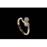 Diamond two stone 18 carat gold and platinum ring, size K.