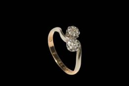 Diamond two stone 18 carat gold and platinum ring, size K.