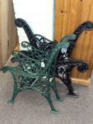 Two pairs of cast iron garden bench ends.