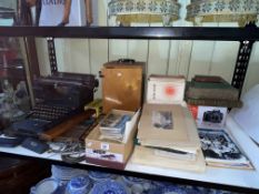 Remington 12 typewriter, binocular, microscope, postcards, Brendan Neiland signed poster 1991,