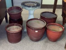 Pedestal bird bath and six various glazed pottery planters.