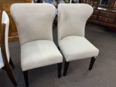 Pair as new contemporary studded wing back side chairs.