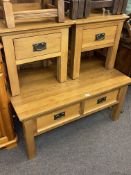 Light oak two drawer low centre table and pair matching single drawer lamp tables (3).