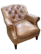 Laura Ashley tan buttoned leather armchair.