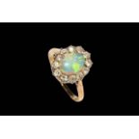 Opal and diamond cluster ring, size O.