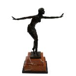 Art Deco style bronze figure of a dancer on marble plinth, 49cm high.