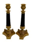 Pair Regency style candlesticks, 23cm.