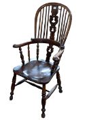 Antique yew wood broadarm Windsor pierced splat back chair.