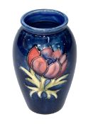 Small Moorcroft Pottery Anemone vase, 10.5cm.