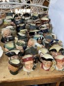 Collection of Royal Doulton character jugs including Benjamin Franklin, Porthos, Ugly Duchess, etc,