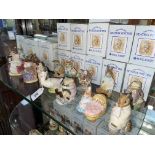 Collection of fourteen Royal Albert Beatrix Potter figures including The Christmas Stocking,