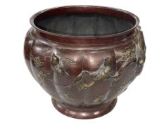 Ornate Oriental bronze jardiniere decorated with raised birds on branch on fluted body, 29cm high.