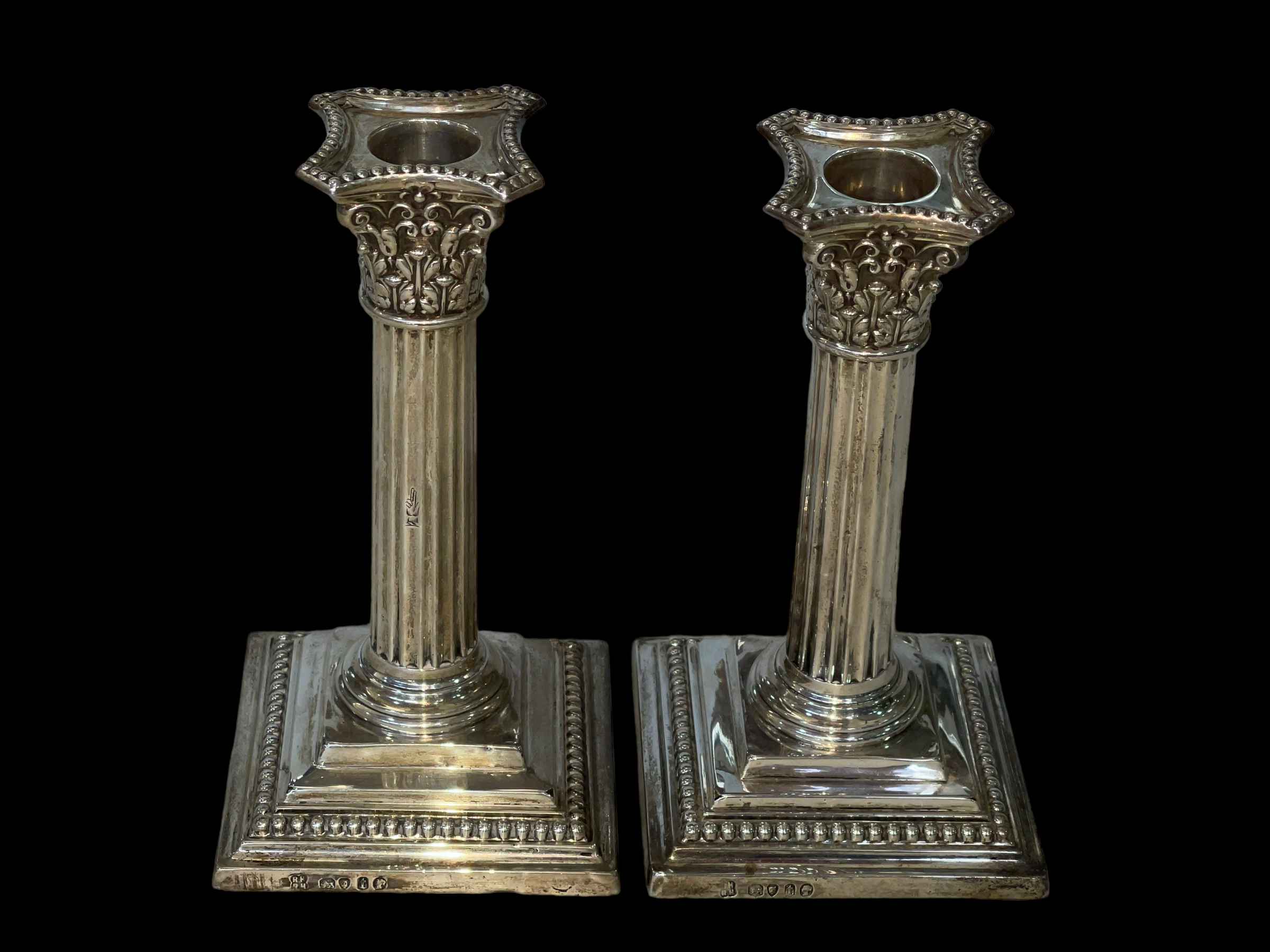 Pair silver loaded Corinthian column candlesticks, London 1874, 15cm.