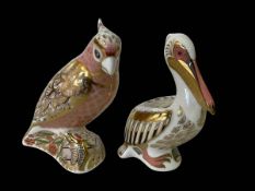 Two Royal Crown Derby paperweights, Cockatoo 13.5cm, and White Pelican, 12.