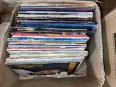 Four boxes of LP and single records.